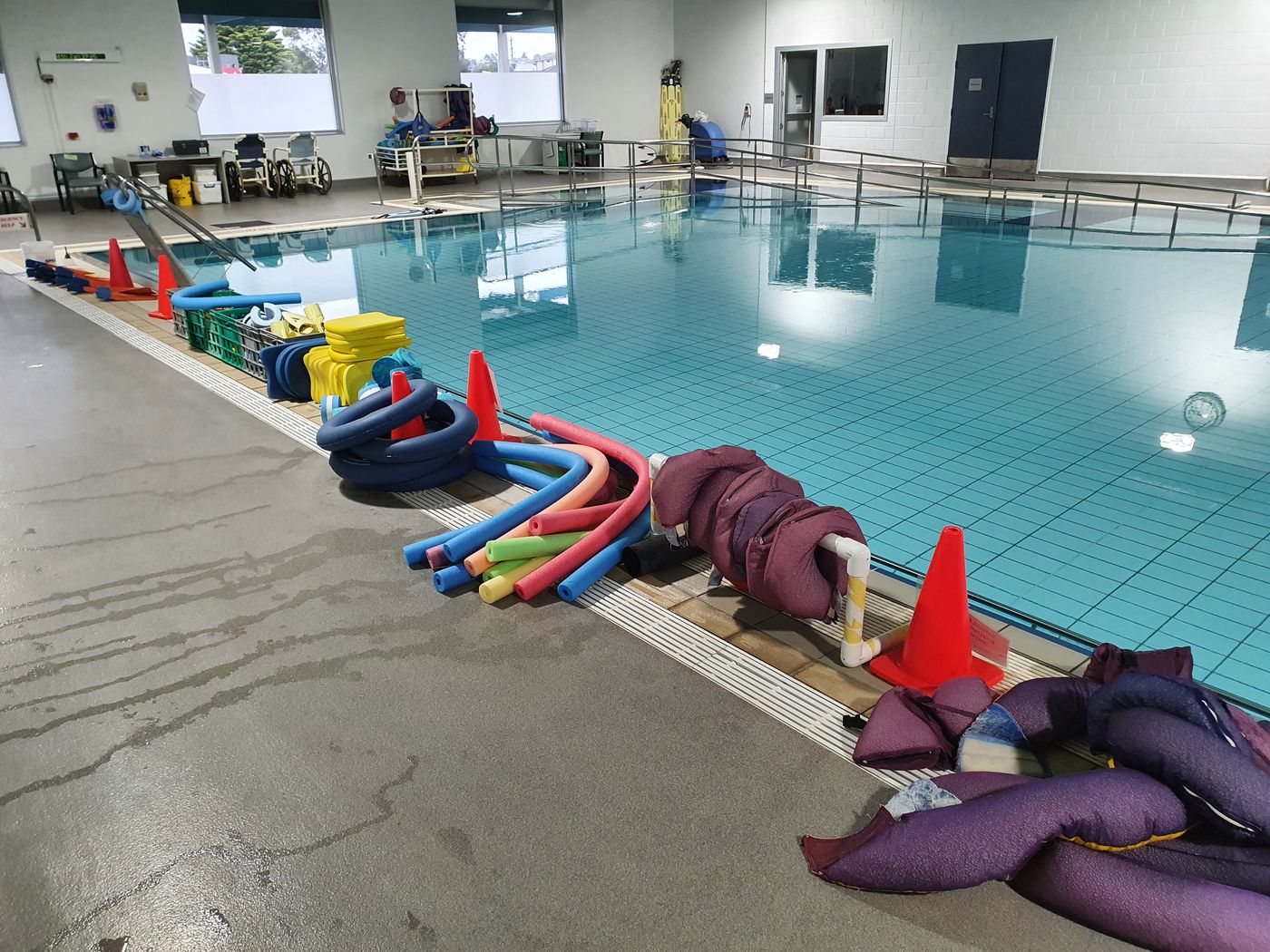 Therapy equipment beside the warm hydrotherapy pool